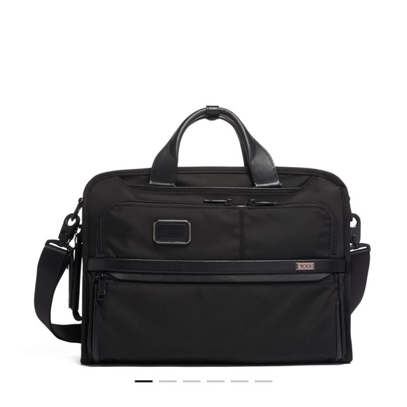 Tumi slim black briefcase like new without monogram! Used only a few times